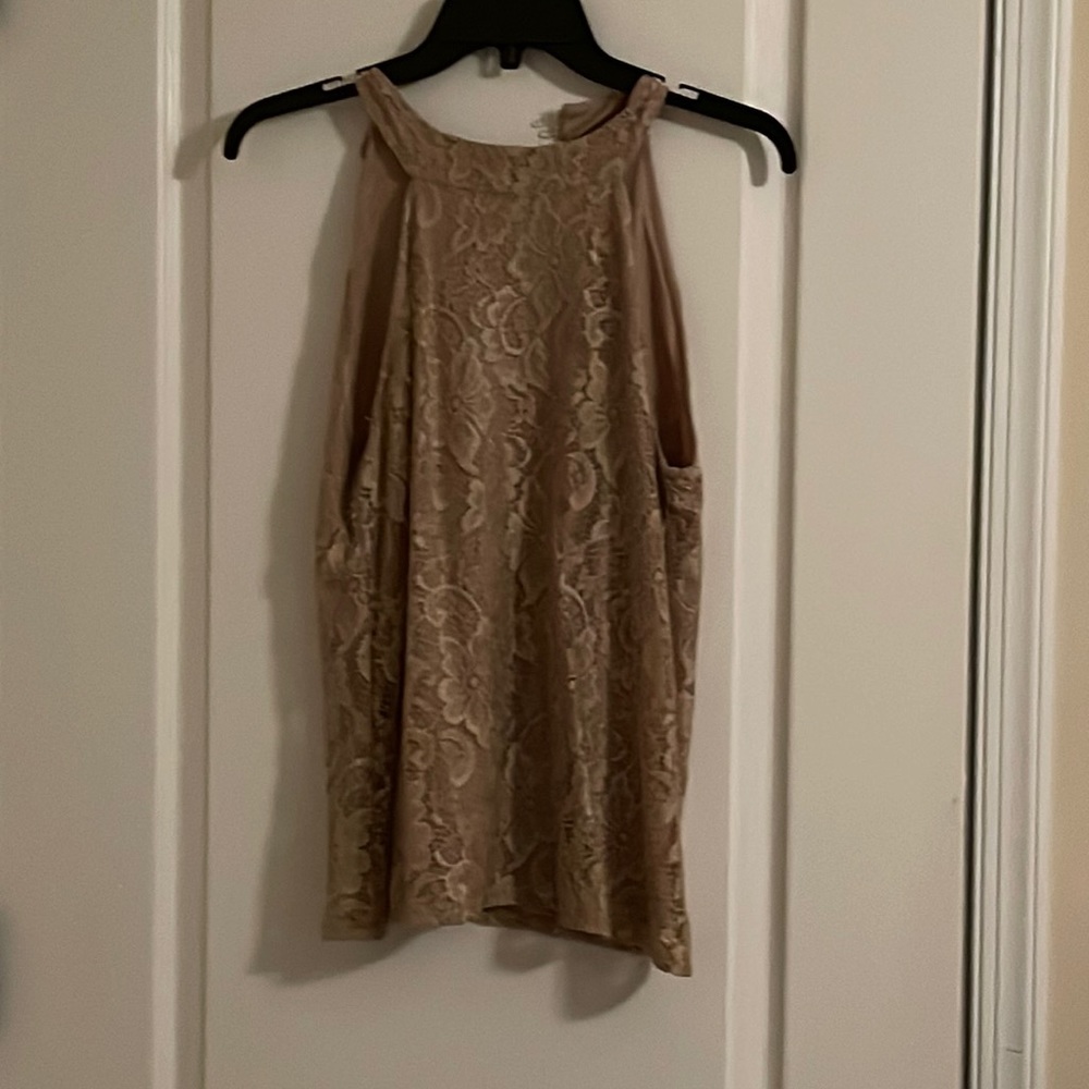 Brown sleeveless top.